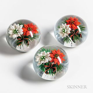 Three Ken Rosenfeld Red and White Poinsettia Paperweights