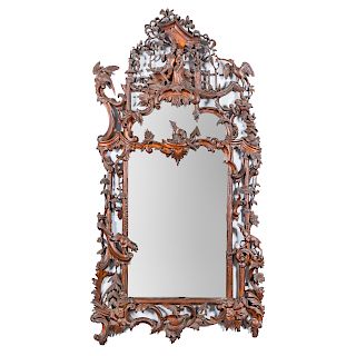 Monumental Chippendale style carved walnut mirror