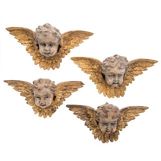 Four continental carved & giltwood seraphin