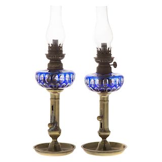 Pair Bohemian cased glass peg oil lamps
