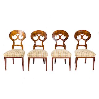 Four Biedermeier walnut veneer dining chairs