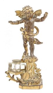 A Gilt Metal Figural Ink Well, Height 12 3/8 x width 5 3/4 x depth 3 3/4 inches.