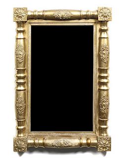 An Early American Giltwood Mirror, Height 29 1/4 x width 20 inches.