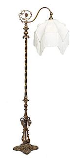 A Cast Metal Floor Lamp, Height 59 1/4 inches.
