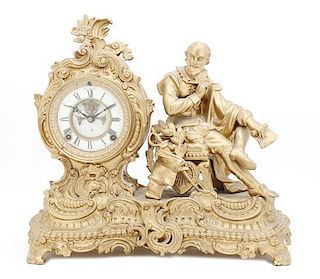 A Gilt Metal Figural Clock, Height 14 7/16 x width 15 3/4 x depth 7 1/2 inches.