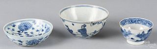 Two Chinese blue and white rice bowls, together with a Nanking cup, largest - 2 3/8'' h., 5'' dia.