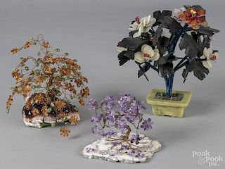 Three Chinese hardstone and wire flowering trees with decorative stone bases, tallest - 9''.