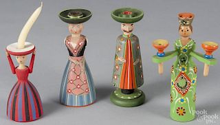 Four Swedish hand-painted wooden doll candle holders, tallest - 7 1/4''.