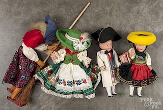 Eight Moll's German celluloid dolls in regional garb from Schwarzwald, Bayern, Hessen