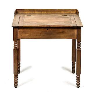 An American Mahogany Flip-Top Writing Desk, Height 35 1/2 x width 34 x depth 25 1/2 inches.