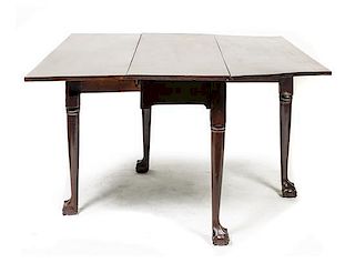 A Queen Anne Drop-Leaf Table, Height 28 x width 45 3/4 x depth 46 3/4 inches.