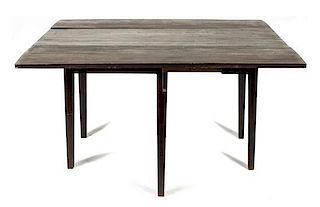 An American Drop Leaf Dining Table, Height 29 x width 56 x depth 50 inches.