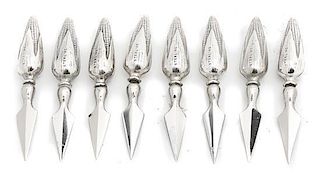 A Set of Eight American Silver Corn Holders, 20th Century, Length 3 inches.