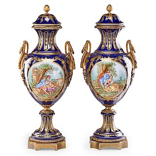 PAIR OF LARGE SEVRES STYLE PORCELAIN URNS