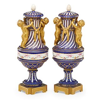 PAIR OF SEVRES STYLE URNS