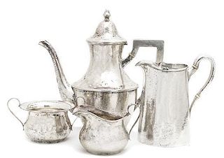 An American Silver Four Piece Tea Set, Shreve and Co., San Francisco, Height of tallest 8 3/4 inches.