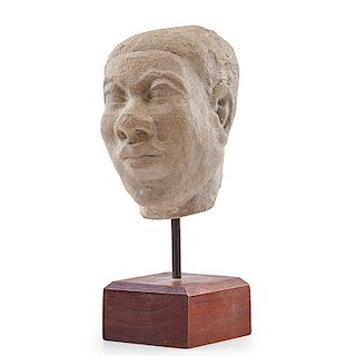 CARVED STONE HEAD OF A MAN