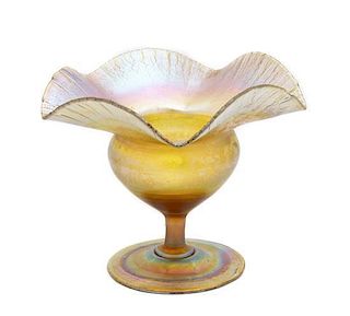 A Tiffany Studios Gold Favrile Glass Floriform Vase, Height 4 1/2 inches.