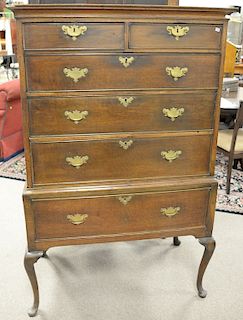 Two over four drawer Queen Anne style oak highboy. ht. 62 1/2 in., wd. 39 in.