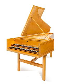 * A Birdseye Maple Harpsichord Height 36 x width 37 1/2 x length 92 inches.