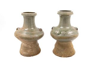 * Two Celadon Glazed Jars Height 14 inches.