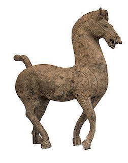 * A Large Grey Pottery Figure of a Horse Height 43 x length 37 inches.