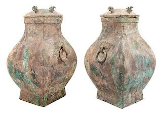 * A Pair of Bronze Covered Vases Height 19 1/4 inches.