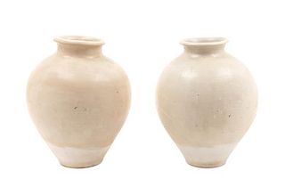 * A Pair of Ovoid Jars Height 11 inches.