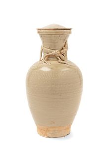 * A Glazed Jar and Cover Height 12 inches.
