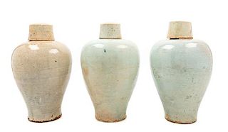 * Three Qingbai Glazed Porcelain Covered Vases Height 13 inches.