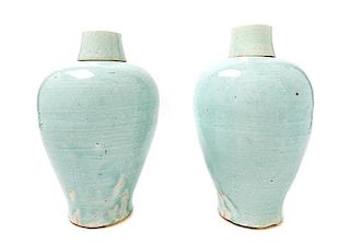 * Two Qingbai Glazed Porcelain Covered Vases Height 14 inches.
