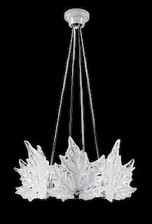 * A Lalique Molded and Frosted Glass Chandelier Height 35 1/2 x diameter 21 inches.
