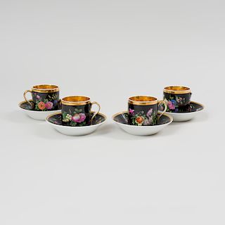 Four Popov Black Ground Porcelain Cups and Saucers