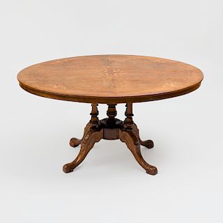 Victorian Carved and Inlaid Walnut Oval Center Table, possibly Continental