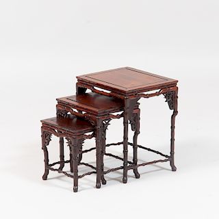 Chinese Carved Hardwood Set of Miniature Nesting Tables