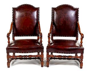 A Pair of Louis XIII Style Walnut Fauteuils Height 43 inches.