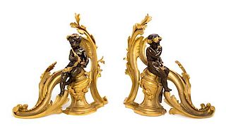 A Pair of Louis XV Style Gilt and Patinated Bronze Chenets Height 15 1/2 inches.