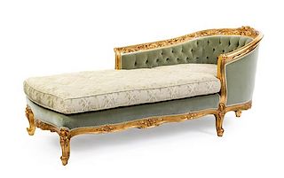 A Louis XV Style Giltwood Chaise Longue Height 32 3/4 x length 76 inches.