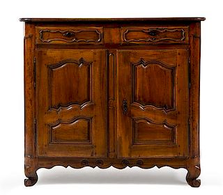 A Louis XV Provincial Walnut Cabinet Height 47 3/4 x width 52 1/2 x depth 26 inches.