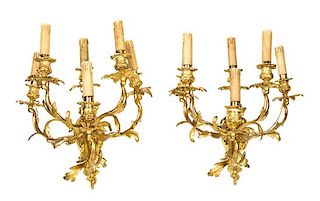 A Pair of Louis XV Style Gilt Bronze Five-Light Figural Sconces Height 19 inches.