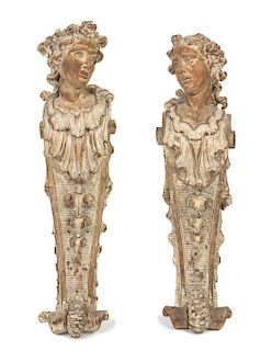 A Pair of Rococo Style Limed Wood Corbels Height 39 1/2 inches.