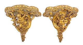 A Pair of Rococo Style Giltwood Brackets Height 13 1/2 x width 15 inches.