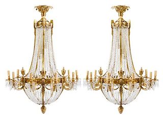 A Pair of Neoclassical Style Gilt Bronze and Cut Glass Ten-Light Chandeliers Height 46 inches.