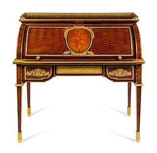 A Louis XVI Style Gilt Bronze Mounted Marquetry Bureau a Cylindre Height 42 x width 43 3/4 x depth 26 inches.