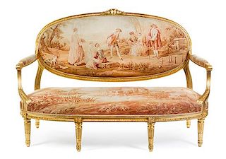 A Louis XVI Style Giltwood Settee Height 43 1/2 x width 65 x depth 27 1/2 inches.