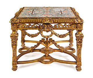 A Louis XVI Style Giltwood Center Table Height 34 x width 45 x depth 45 inches.