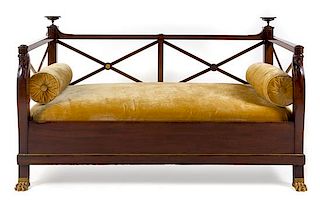 An Empire Mahogany Daybed Height 36 1/2 x width 62 1/4 x depth 33 inches.