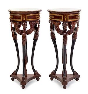 A Pair of Empire Style Gilt Metal Mounted Mahogany Pedestals Height 35 1/2 x diameter of top 17 1/4 inches.
