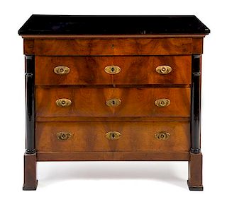 * An Empire Style Parcel Ebonized Mahogany Chest of Drawers Height 35 x width 40 1/2 x depth 21 5/8 inches.