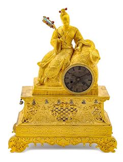 A Charles X Gilt Bronze Figural Mantel Clock Height 16 inches.
